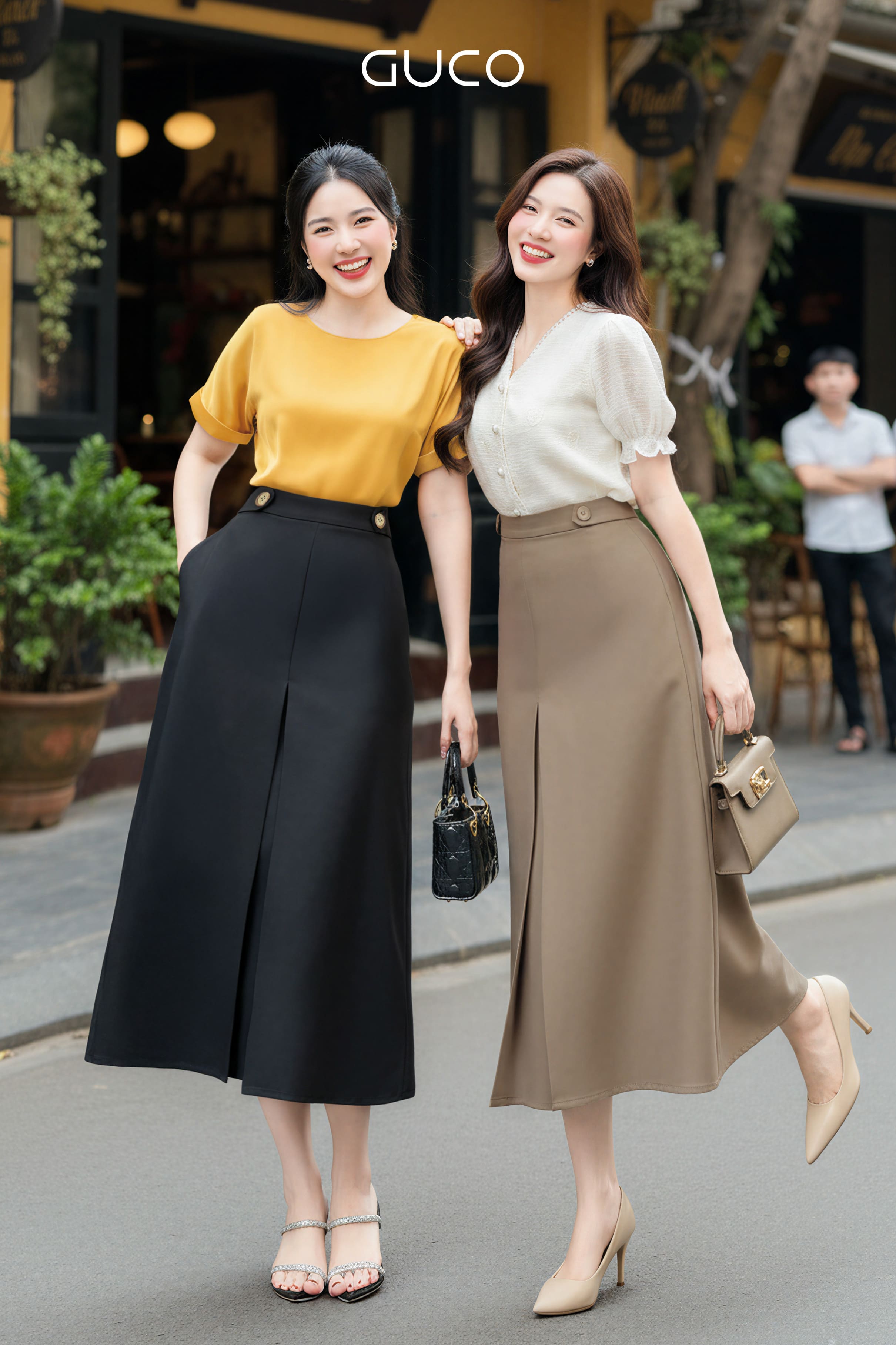 CHÂN VÁY XẾP LI GIỮA ĐÍNH NÚT 2 BÊN - BE ĐEN - CV283